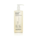 A tall rectangular bottle of Giovanni Cosmetics SMOOTH AS SILK™ DEEP MOISTURE SHAMPOO with pump dispenser and a white label with black text. This color-safe shampoo is available in 2 sizes and is designed for damaged hair.