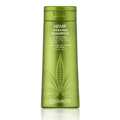 A green 250 mL Giovanni Cosmetics HEMP HYDRATING SHAMPOO bottle showcases a large hemp leaf and white text for all hair types. This hydrating, vegan formula is part of their hair care line and comes in three sizes.