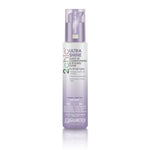 A bottle of Giovanni Cosmetics 2chic® ULTRA-SHINE LEAVE-IN CONDITIONING ELIXIR with a lavender and white label, pump top, and text emphasizing White Tea and Tsubaki blossom for all hair types in natural hair care.