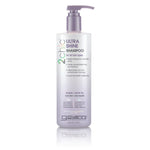 A bottle of Giovanni Cosmetics 2chic® ULTRA-SHINE SHAMPOO, suitable for all hair types and frizzy hair, features a pump dispenser and highlights Tsubaki and White Tea for natural care. Available in 2 sizes.