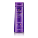 A purple bottle of Giovanni Cosmetics CURL HABIT™ Curl Defining Conditioner for all curl types, featuring coconut, jojoba, and shea butter to define and moisturize curls. Size shown: 13.5 FL OZ (399 mL); product benefits are highlighted on the label.