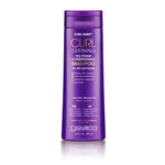 A purple bottle of Giovanni Cosmetics CURL HABIT™ Curl Defining No-Foam Conditioning Shampoo for all curl types with coconut oil, jojoba, and shea butter to moisturize curls. 13.5 fl oz (399 mL).