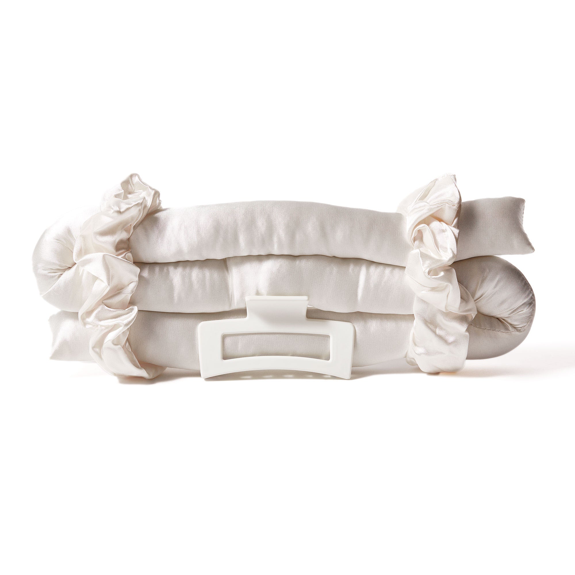 for healthy-looking hair - Introducing the HEATLESS SATIN HAIR CURLING SET (ivory) by Giovanni Cosmetics—this white satin curling kit includes two scrunchies wrapped around soft fabric rods and a large white plastic hair clip positioned in front, expertly designed to create frizz-free, no heat curls with ease.