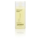 A 2 fl oz (60 ml) travel-size bottle of Giovanni Cosmetics SMOOTH AS SILK™ DEEP MOISTURE SHAMPOO, a paraben-free, color-safe shampoo for damaged hair, features a translucent cap, light yellow liquid, and labeled brand details.